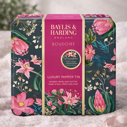Baylis & Harding pamper gift set displayed with body care items, candle and relaxed home setting for gifting