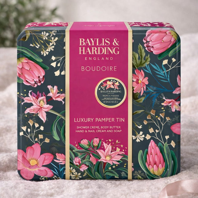 Baylis & Harding pamper gift set displayed with body care items, candle and relaxed home setting for gifting