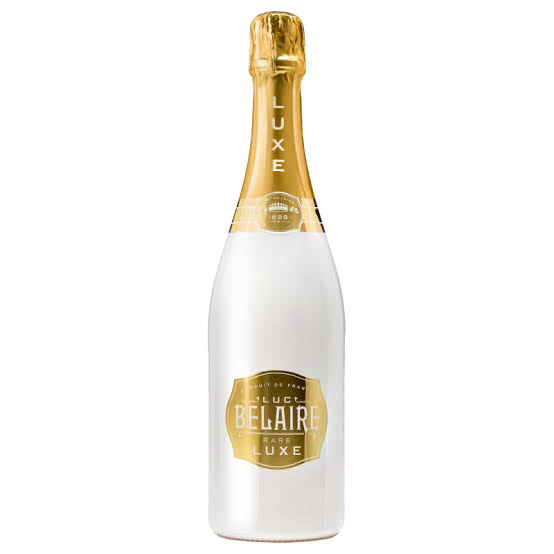 Luc Belaire Luxe White champagne bottle with gold foil neck and white frosted glass design.