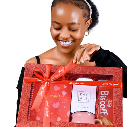 Take My Heart package with Biscoff biscuits, Kayali perfume, mug, and gift set in red box.